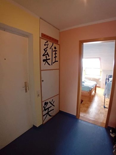 Gemütliche Dachgeschosswohnung mit Seesicht – Flur