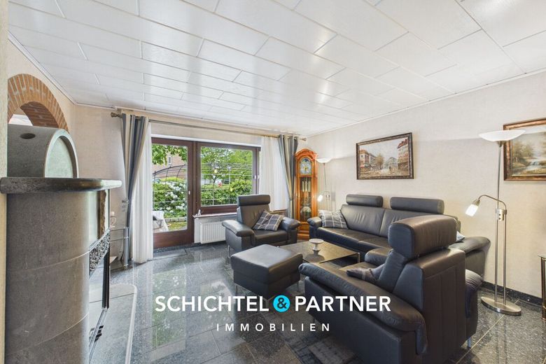 Achim-Zentrum| Freistehendes Ein-  Zweifamilienhaus mit Garten – S&amp;P | Wohnzimmer