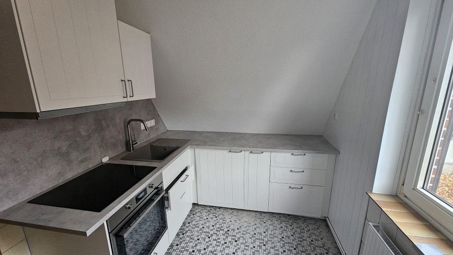 Mehrfamilienhaus in Itzehoe kaufen – 3 Wohnungen + Gewerbe, voll vermietet – OG Wohnung hinten Küche