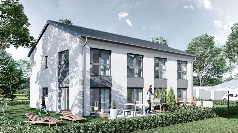 Energieeffizientes Wohnen im Einklang mit der Natur – Ansicht Garten