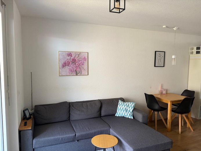 Wohnzimmer mit Küche