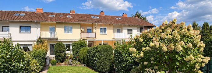 4-room terraced house with garden and garage in Diepholz – commission-free – Garten und Blick zur Hausreihe