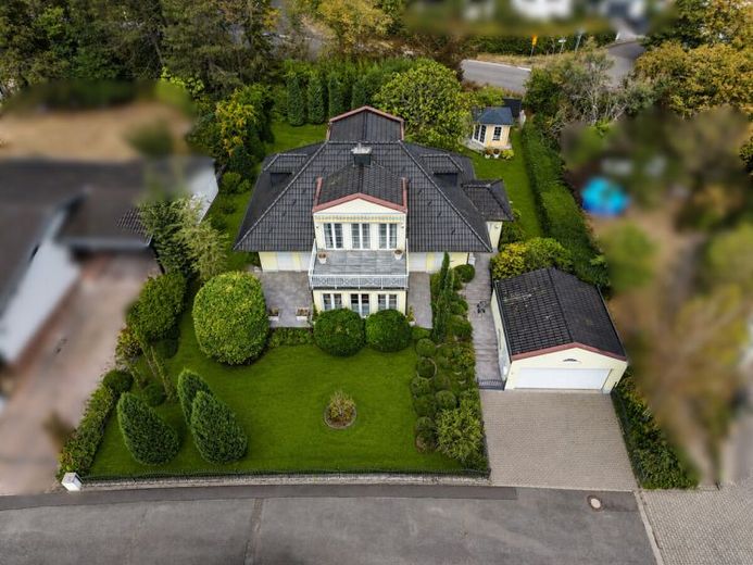Stilvolles Einfamilienhaus mit italienischem Flair in ruhiger Sackgasse – mit Doppelgarage – Foto 1