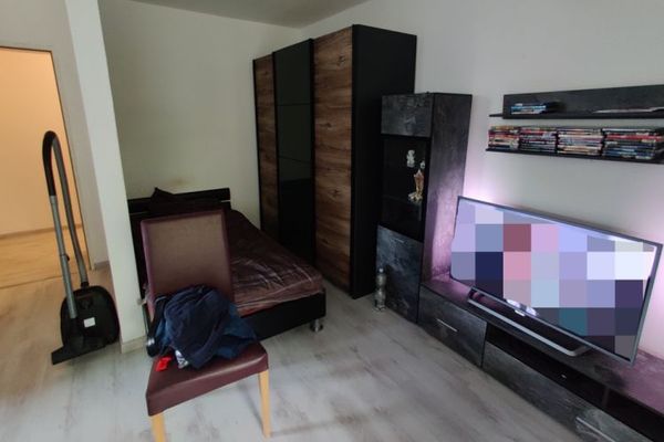 Vermietete zentrale 1-Zimmer-Wohnung 
mit Tiefgaragenstellplatz in Gütersloh