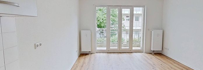 ** Luminoso appartamento di 2 locali con BALCONE e CUCINA ATTREZZATA a Stötteritz ** – Ansicht I: Wohn- und Esszimme…