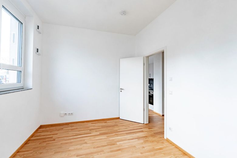 Lichtdurchflutete Neubau 3,5-Zimmer Maisonettewohnung: Loft-Charakter in zentraler Lage – Schlafzimmer EG