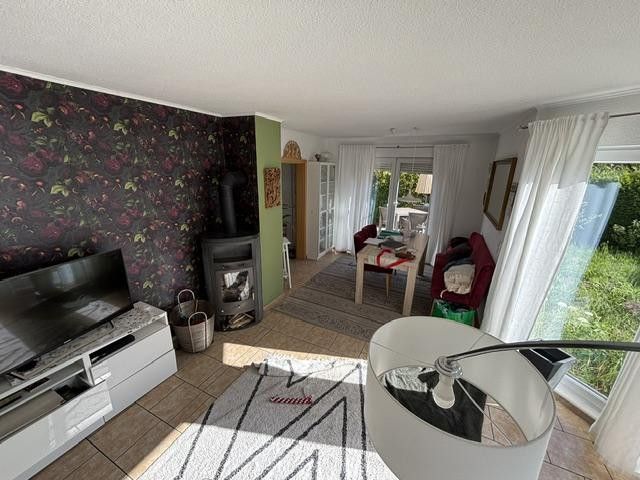 Wohnzimmer mit Kamin 