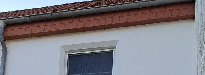 Maison mitoyenne attrayante avec combles aménagés