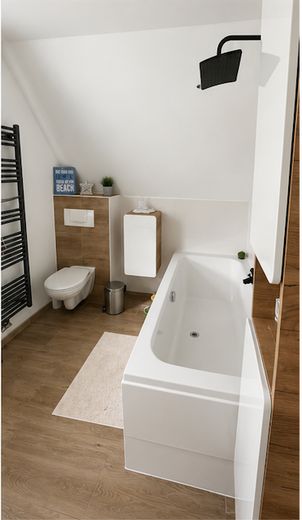 Casa unifamiliare con grande giardino – Bad 1.OG