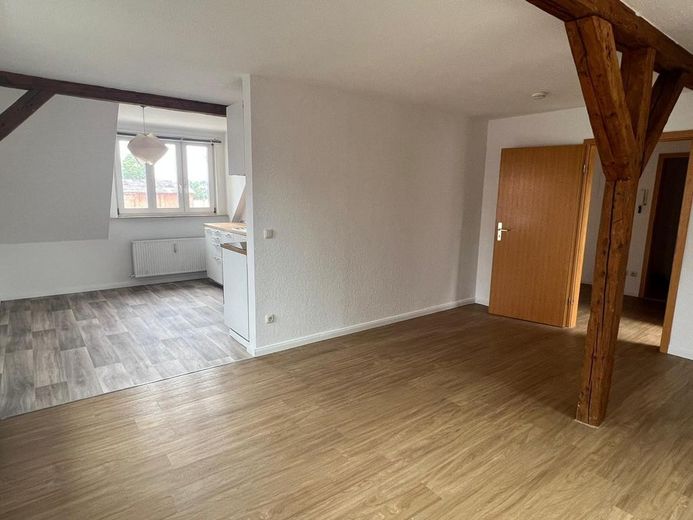 Helle und charmante 2-Zimmer-Wohnung in Perdöhl – Wohnzimmer Richtung Küche