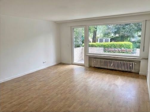 Wohntraum in Hilden! Modernisierte 3 Zimmer EG Wohnung mit Balkon, Gartennutzung und Stellplatz – Wohnzimmer nach Modernisierung