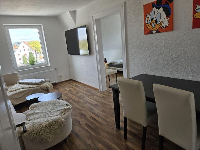 Budynek wielorodzinny w Kempten, Sankt Mang, z 8 mieszkaniami, 3 garażami i potencjałem rozbudowy – Wohnzimmer Whg 3.OG