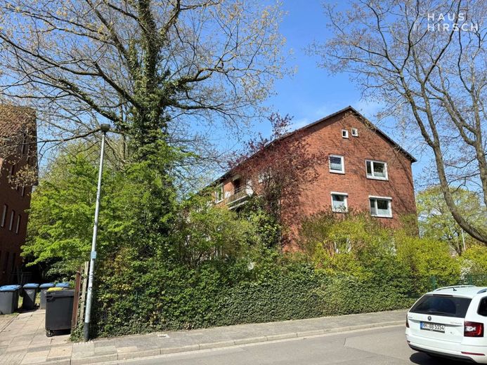 Vermietete Wohnung mit Mietsteigerungsportential – Blick auf die Giebelseite