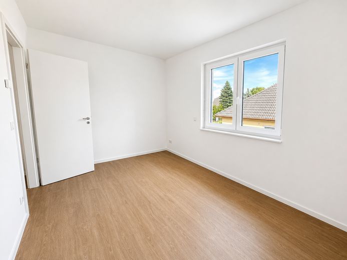 Erstbezug im Neubau! Moderne 2-Zimmer Wohnung mit QNG-Plus Siegel und Einbauküche! – Schlafzimmer