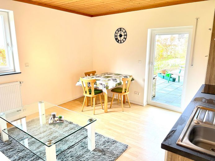 Wohnzimmer mit Wohnküche