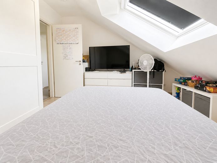 Appartement moderne de 2 pièces au dernier étage avec balcon orienté sud, situé au centre de Versmold – Schlafzimmer