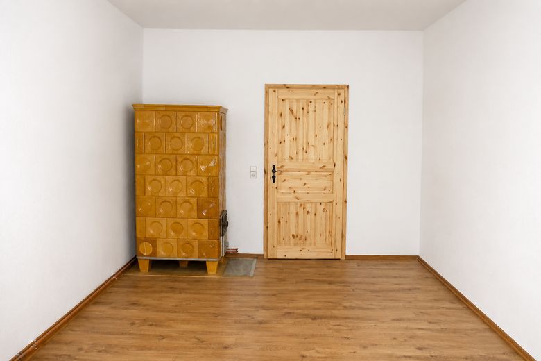 Wohnzimmer mit Ofenheizung 