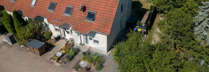 Gepflegtes Reihenhaus mit Kamin, Garten & 3 Stellplätzen in Niederzimmern