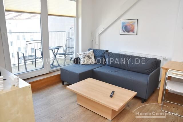 Zentrum, Modern möblierte DG-Wohnung mit Dachterrasse und offener Küche in zentraler aber ruhiger Lage – f36d08b64a4351f71f3c36d9674952bb8a582f55.jpg