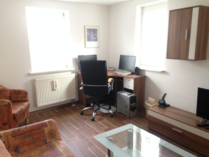 Wohnzimmer mit Arbeitsecke