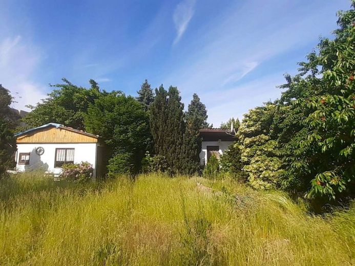 Baugrundstück mit Wochenendhaus unmittelbar an Berliner Stadtgrenze – Foto 1