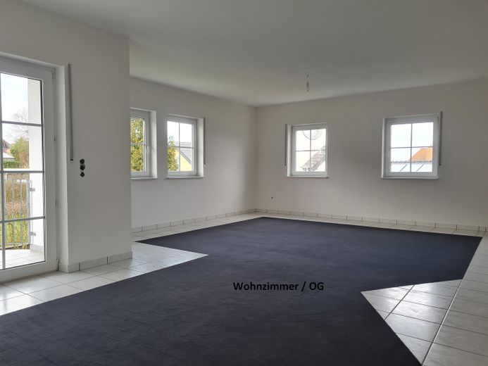 Exclusive maisonette apartment in Beckerswäldchen – Wohnzimmer EG