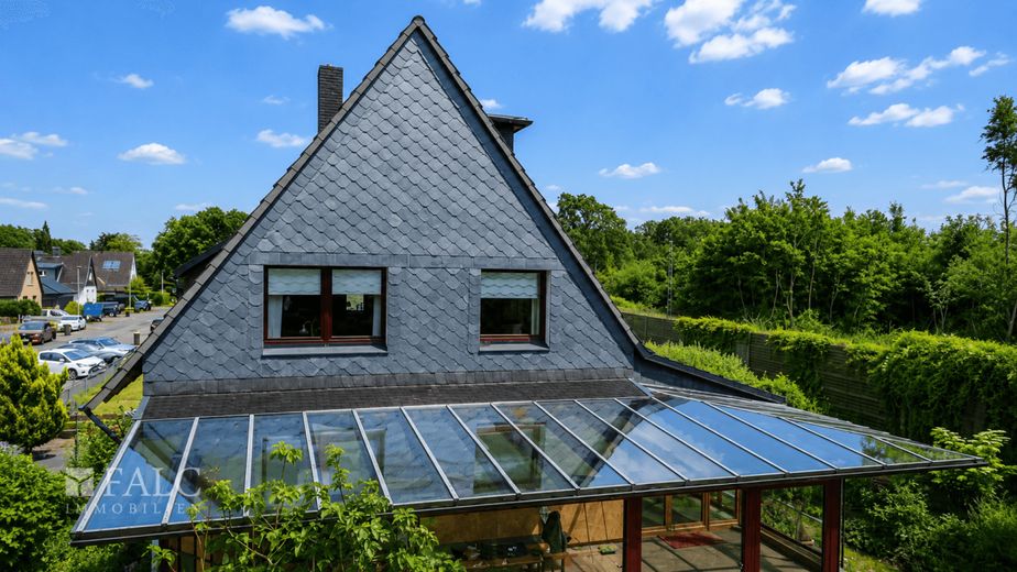 Gartenidylle mit Wintergarten-charmantes Einfamilienhaus zum Wohlfühlen in der Nähe von Langen – Ansicht Wintergarten rückwärtig