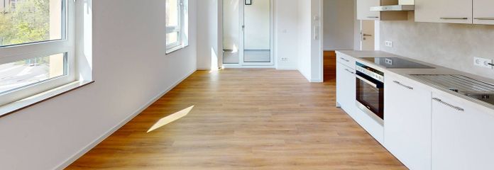 First occupancy: Ultra-modern 3-room new-build apartment with fitted kitchen and loggia in eastern Nuremberg – Ansicht I: Wohn- und Esszimme…