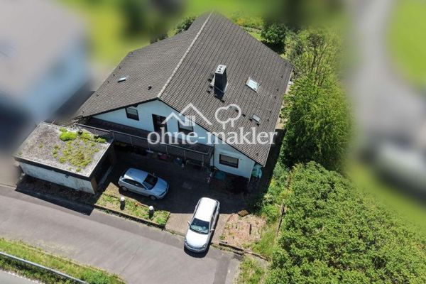 6,57 % rendement, zonder makelaarscourtage! 2- tot 3-familiehuis op een verhoogde locatie met uitzicht op het Siegtal