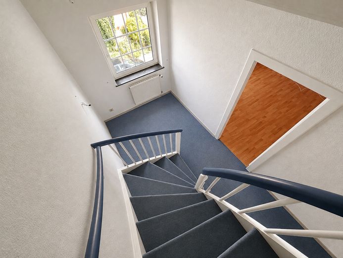 End-of-terrace house with balcony and garage in a popular location! – Flur 1. OG