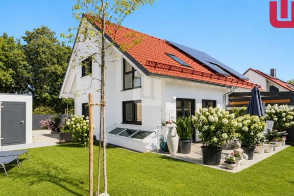 WINDISCH - Esclusiva bifamiliare energeticamente efficiente in posizione privilegiata, con finiture di alta qualità e giardino da sogno