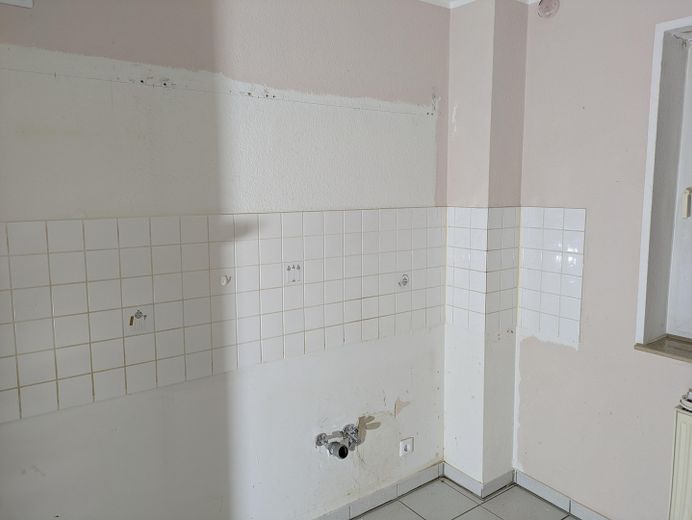 Küche mit Fliesenspiegel