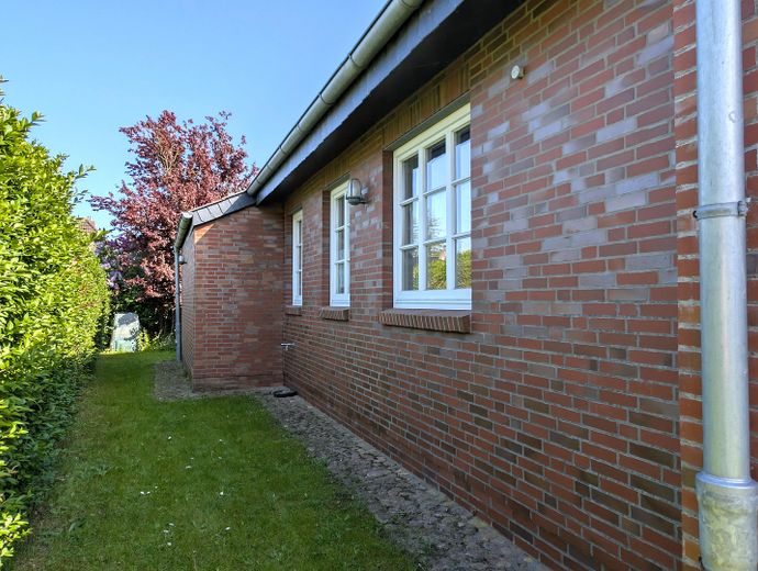 Top ausgestattetes Einfamilienhaus in Wyk-Boldixum, barrierearm – Rückwärtige Hausseite