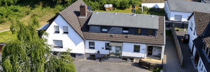 Einzigartiges Immobilienensemble im Herzen von Solingen – 5 Garagen und ein Traumgrundstück