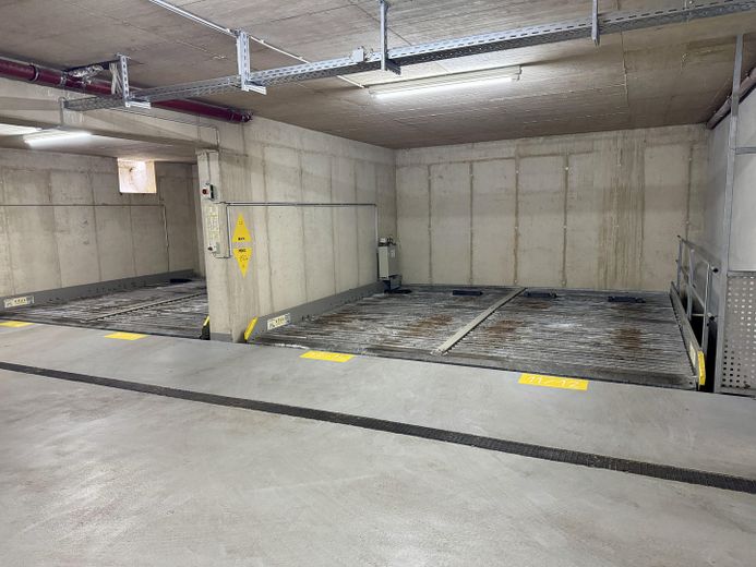 2-Zimmer-Souterrain-Wohnung mit Terrasse und EBK – opt. Tiefgaragen Stellplatz