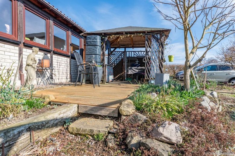 Großzügiges 3-Familienhaus in idyllischer Feldrandlage von Hessisch Oldendorf - OT Rohden! – EG Hp - (Außen) - Überdachte Terrasse, straßenseitig