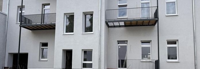 Exklusive Dachgeschosswohnung mit Balkon in aufwendig saniertem Gründerzeithaus