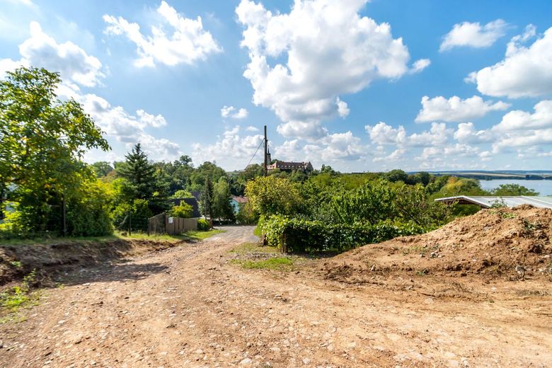 Traumgrundstück in Seeburg - genehmigte Bauvoranfrage für Wohnbebauung &amp; unverbaubarer Seeblick! – Außenaufnahme