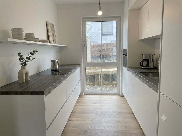 First occupancy – garden maisonette with high-quality fittings – Exklusive Einbauküche