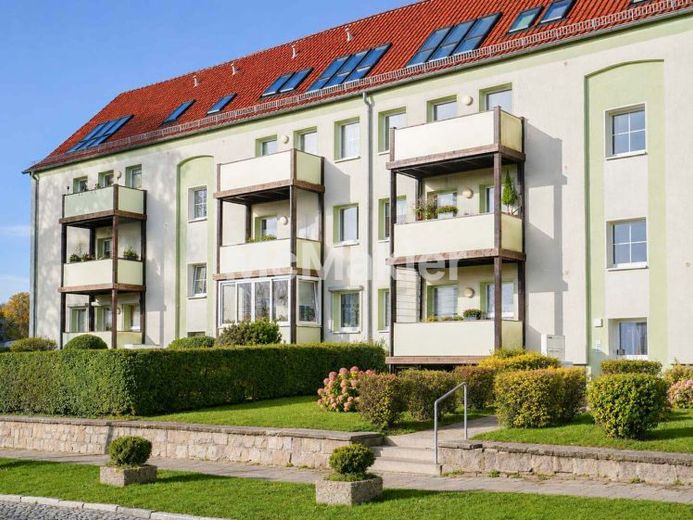 Erdgeschosswohnung mit Gestaltungspotenzial, Wintergarten-Balkon & 2 PKW-Stellplätzen an der Ostsee – Foto 1