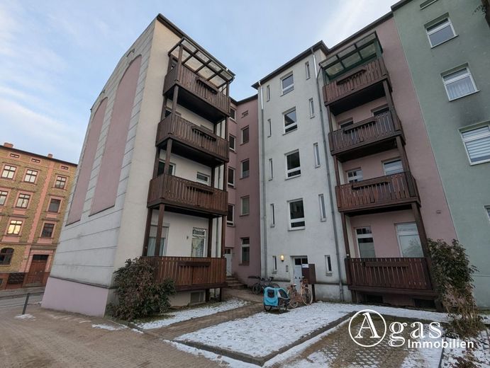3-Zimmer-Erdgeschosswohnung mit Balkon und Keller in Eberswalde – Hausrückseite