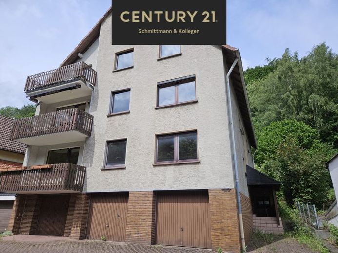 Attraktive Kapitalanlage mit Potenzial: Mehrfamilienhaus mit 6 Eigentumswohnungen & Garagen in Hemer – Foto 1