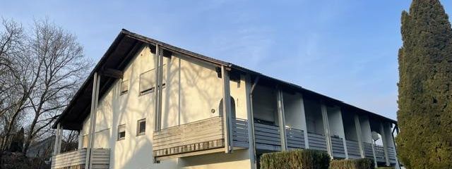 Mehrfamilienhaus mit Wertsteigerungspotenzial in hervorragender Lage – Seitenansicht
