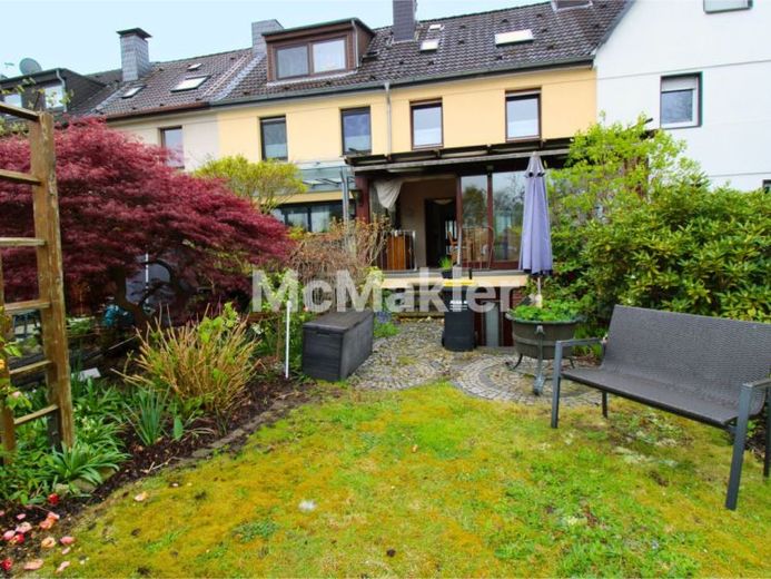 Charmantes Reihenmittelhaus mit großem Potenzial und Garten – Foto 1