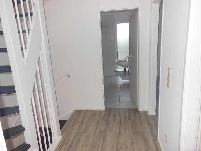 Tussenwoning met veel ruimte voor het gezin – Flur 1. OG