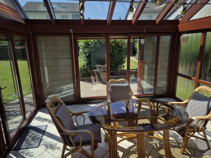 Einfamilienhaus mit Einliegerwohnung, Wintergarten, Garage und Gartenparadies auf 708 m2 – Wintergarten OG