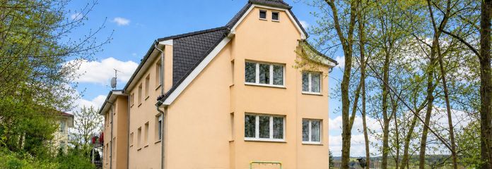 Familienfreundliche Wohnung mit Garten in Waldrandlage und Innenstadtnähe – Außenansicht
