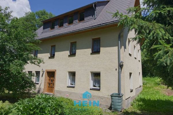 Una casa con cuore e potenziale nella città montana di Schneeberg: parzialmente ristrutturata e pronta per le vostre idee!