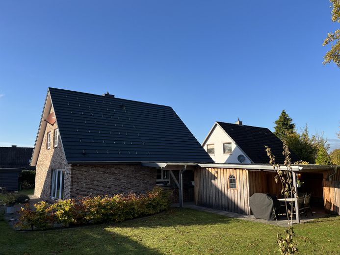Familiengerechtes Wohnen - Einzugsfertig - Hochwertig saniert – Garten Rückseite mit Schuppen