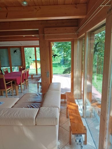 Einzigartiges Holzhaus im Grünen in Randlage und doch zentral – Foto 45